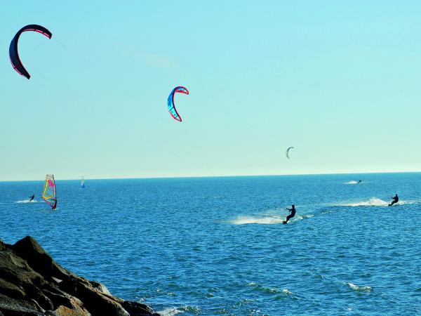 Kite surfers in action